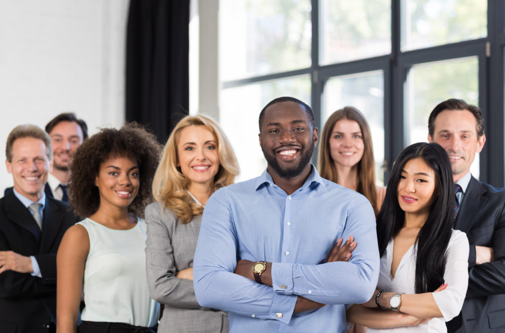 African American Businessman Boss With Group Of Business People In Creative Office, Successful Mix Race Man Leading Businesspeople Team Stand Folded Hands, Professional Staff